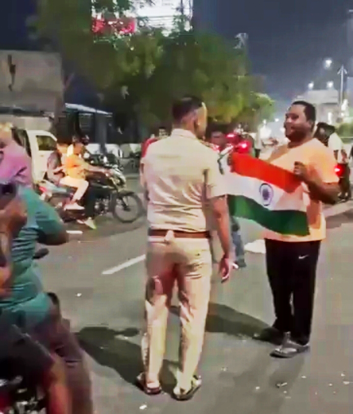 A Man Showing Indian Flag to Hyderabad Police. After Ind vs NZ Cricket Match Champions Trophy 2025 India Won Celebration 